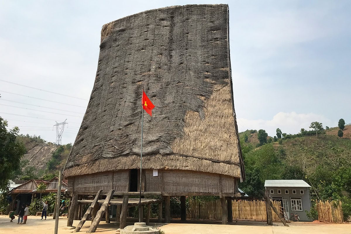 Tall-roofed Rong communal house in a Kon Tum village.